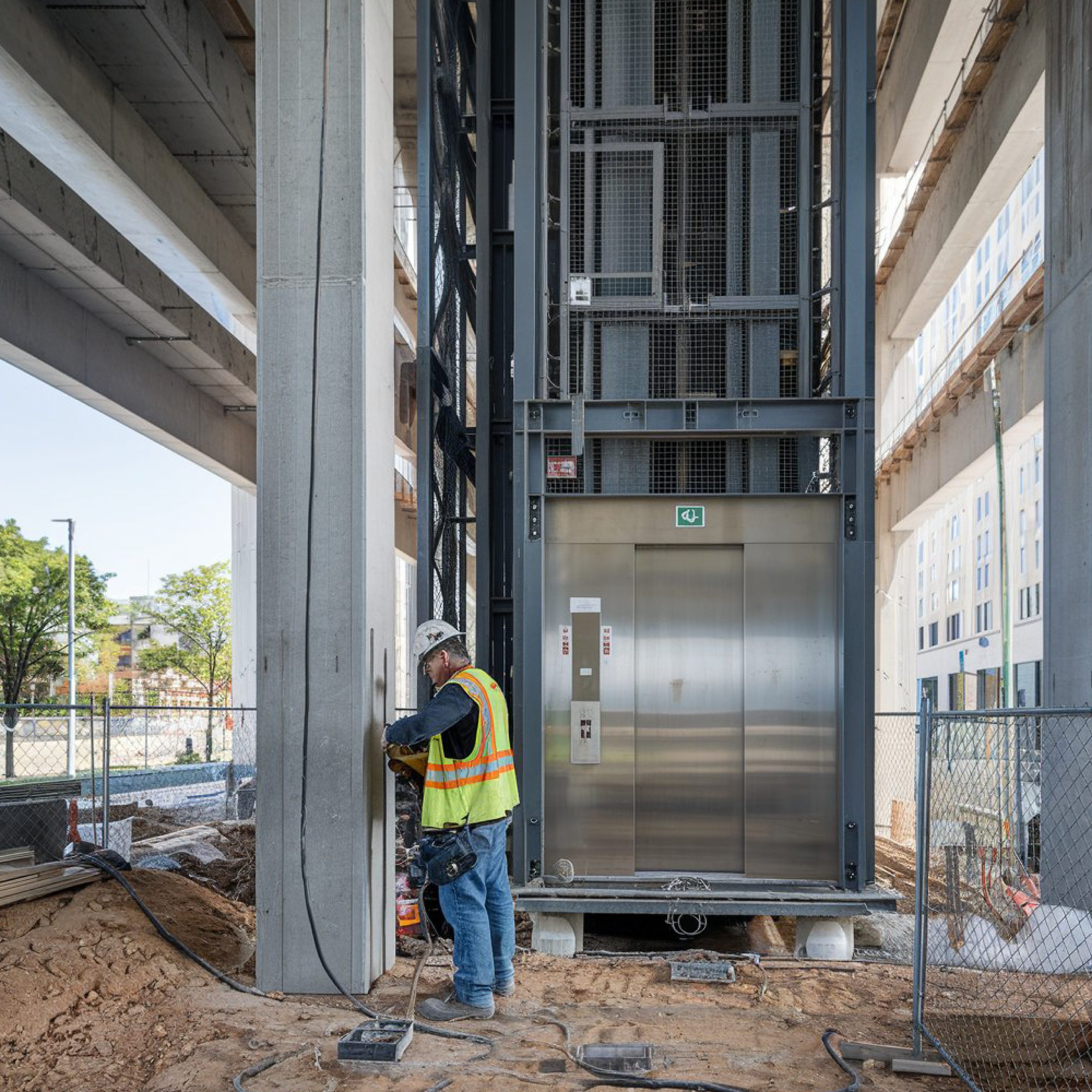 man-construction-vest-is-working-construction-site
